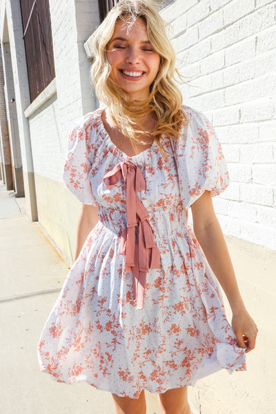 Dazzle In Ivory/Peach Ribbon Tie Scoop Neck Tiered Waist Floral Dress