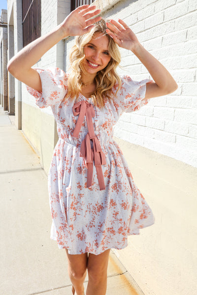 Dazzle In Ivory/Peach Ribbon Tie Scoop Neck Tiered Waist Floral Dress