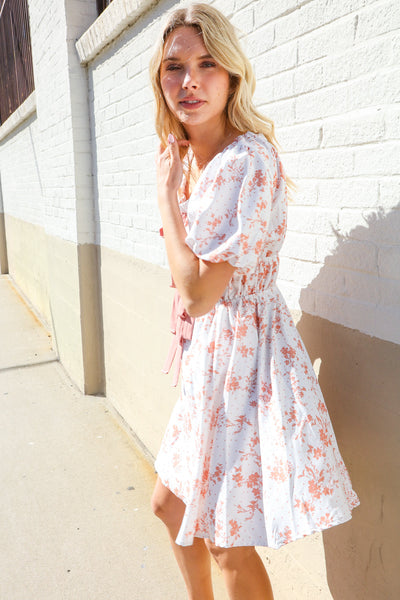 Dazzle In Ivory/Peach Ribbon Tie Scoop Neck Tiered Waist Floral Dress